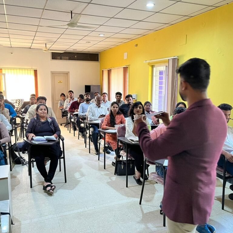 Bilal Siddiqui conducting a training session in a classroom